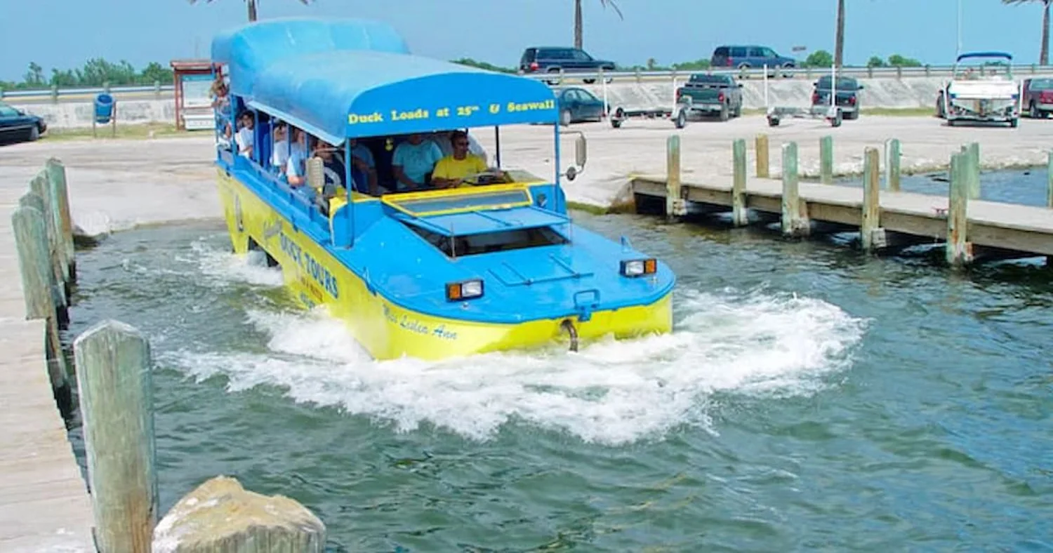 A Galveston Duck Tours amphibious Duck boat splashing into the bay