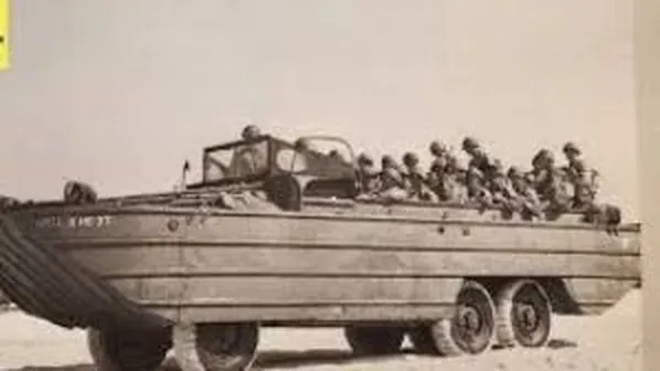 Black-and-white photograph of a 1940s WWII DUKW amphibious vehicle