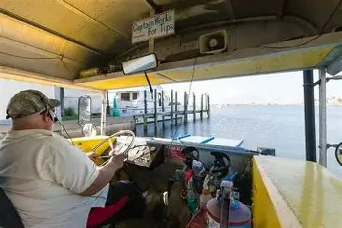Riders aboard the open-air Duck tour